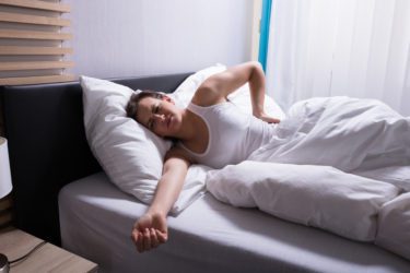How to Get to Sleep (And Stay Asleep) With a Bulging Disc?