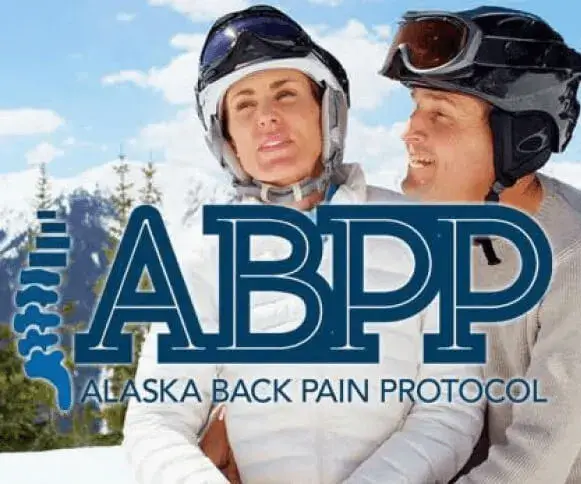 The logo of Alaska Back Pain Protocol with a couple doing winter sports.