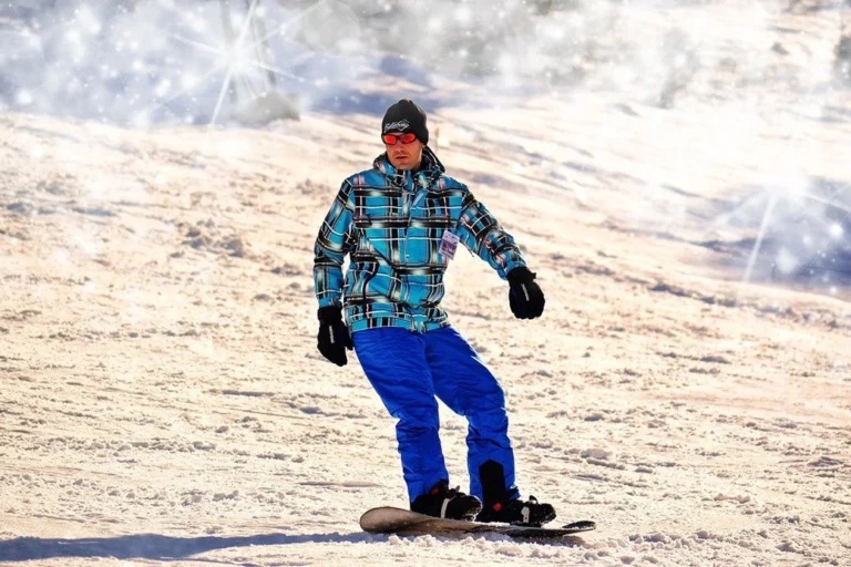 A man snowboarding.