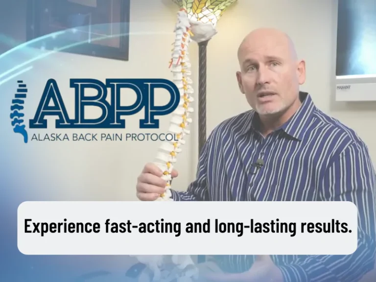 A photo of Dr. Brent Wells holding a spine anatomy dummy with the logo of Alaska Back Pain Protocol.